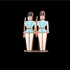 Vintage enamel on gold tone metal soldiers pin brooch